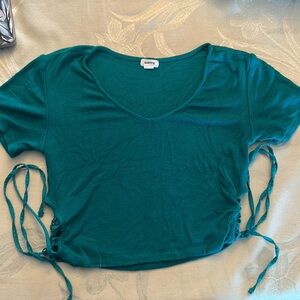 Green garage cropped shirt with ties on side